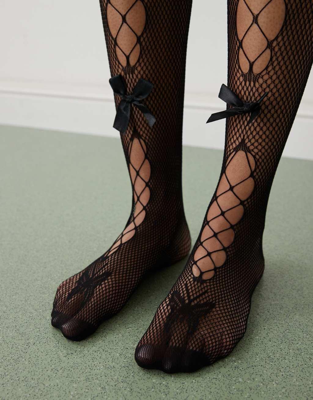 Reclaimed Vintage halloween knee high socks with cutouts and ruffle in black Product Image