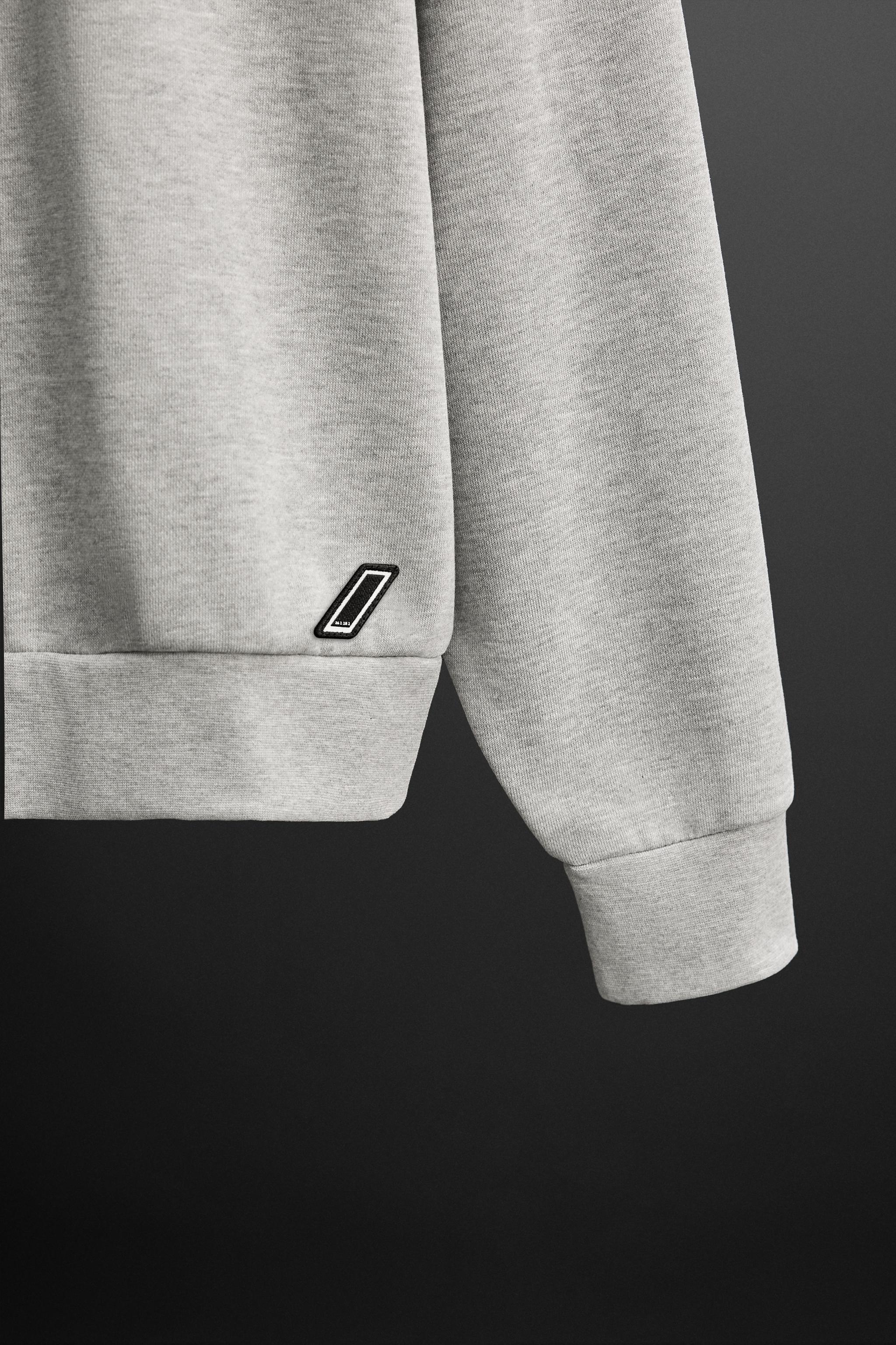 QUARTER ZIP SWEATSHIRT Product Image