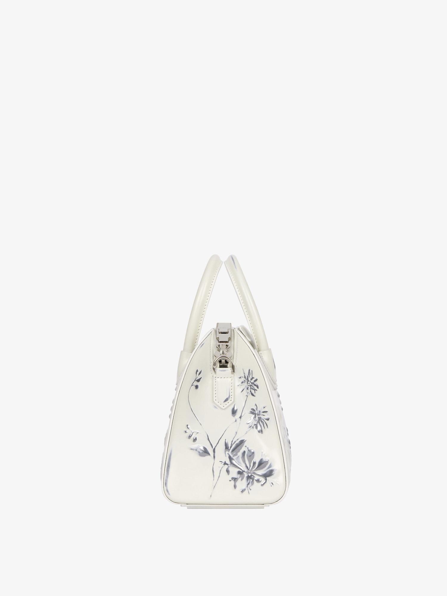 Mini Antigona bag in leather with floral pattern Product Image