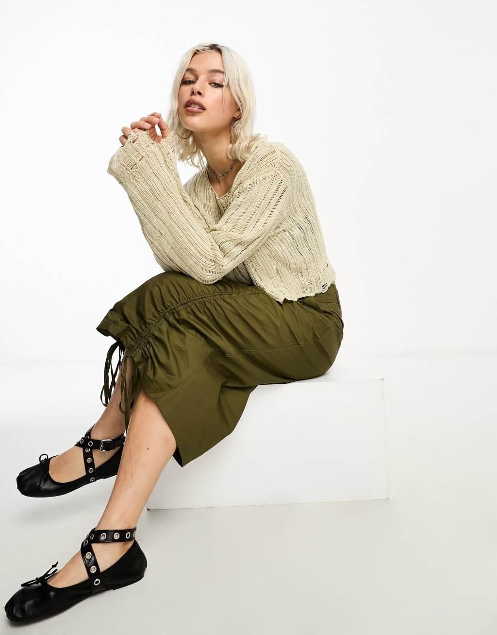 COLLUSION cropped distressed nibbled hem sweater in stone Product Image