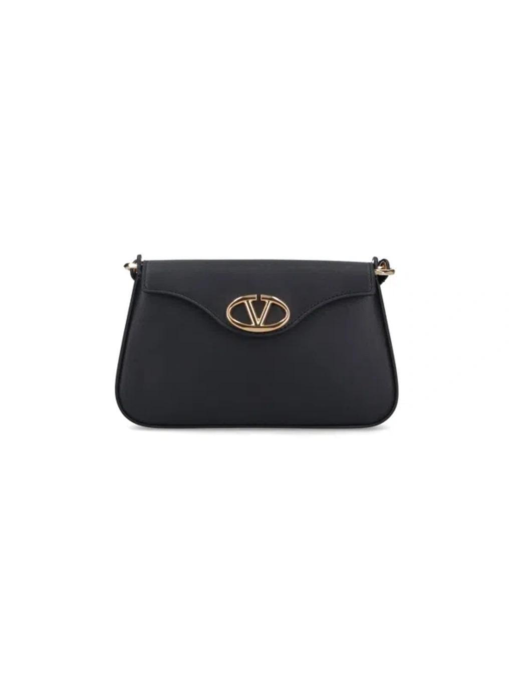 VALENTINO GARAVANI Valentino Logo Plaque Foldover Top Shoulder Bag In Black Product Image