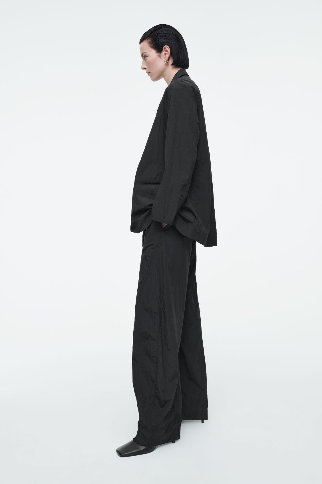 DECONSTRUCTED NYLON BARREL-LEG PANTS Product Image