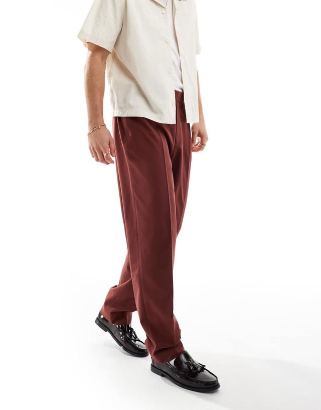 ASOS DESIGN pull on smart oversized tapered pants in burgundy Product Image