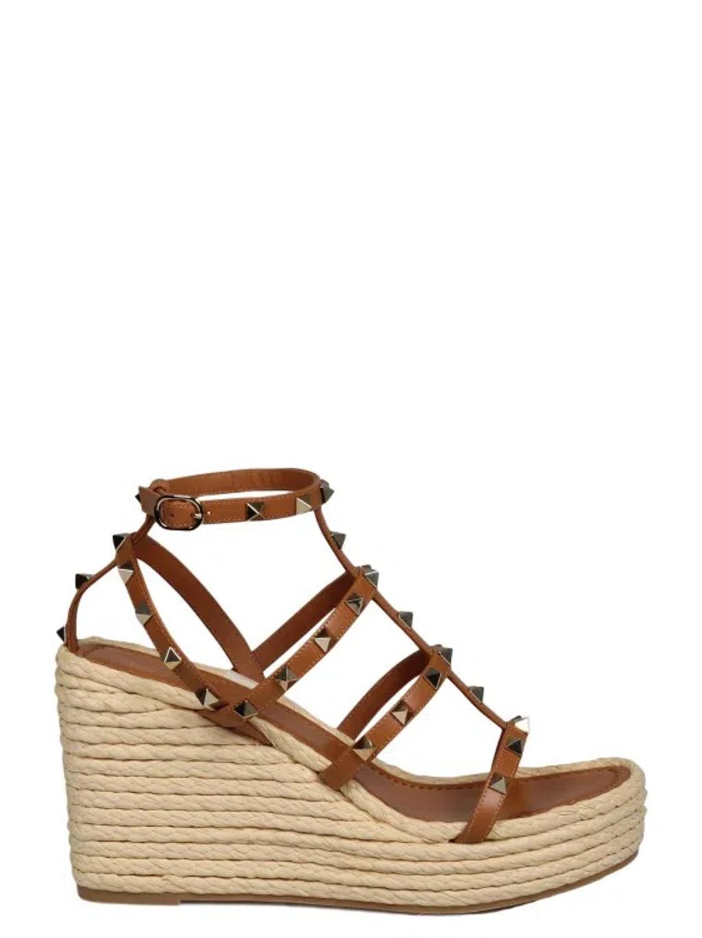 Valentino Rockstud Caged 95 Leather Wedge Sandal In Brown Product Image