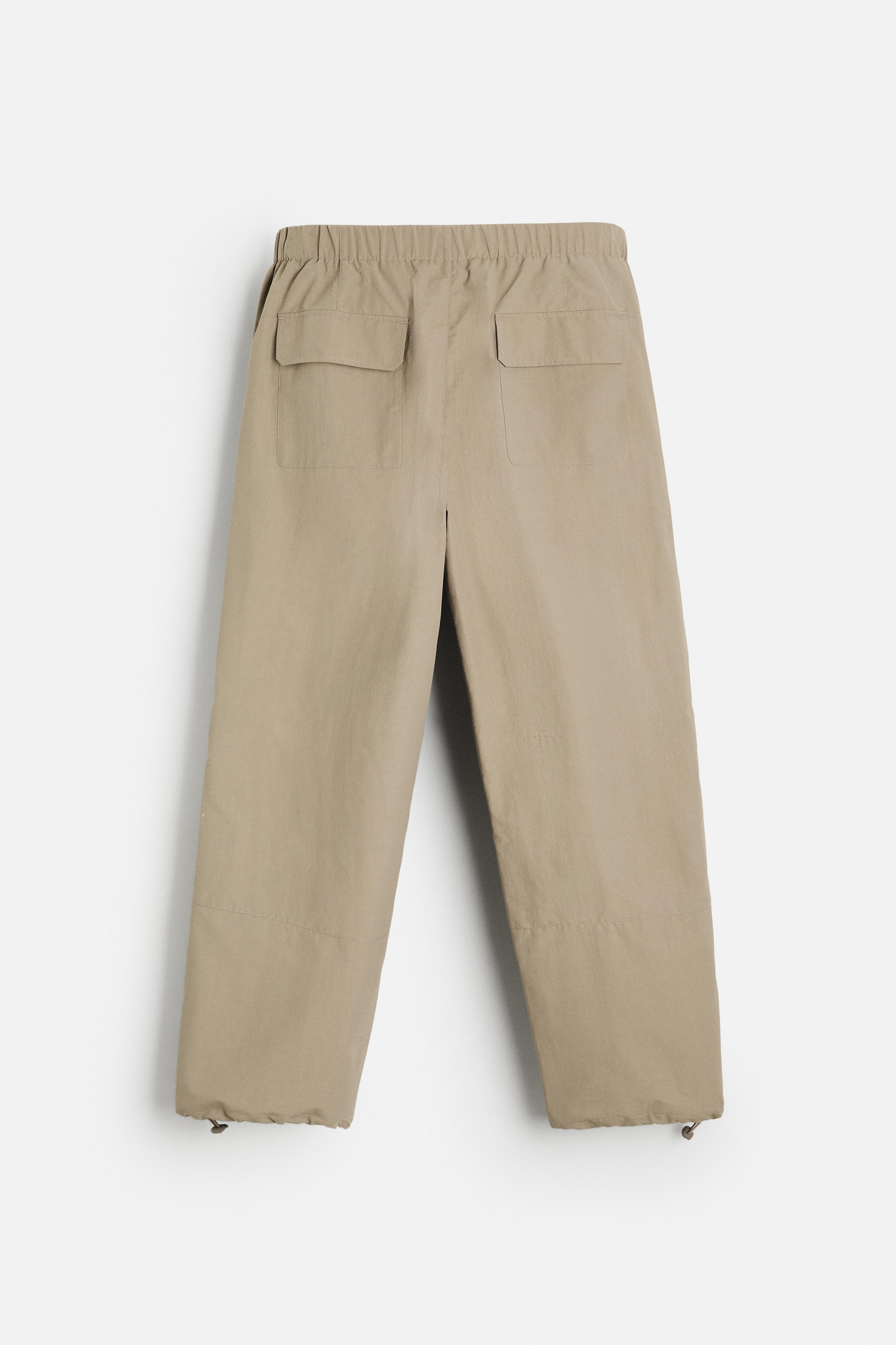 TECHNICAL WATER REPELLENT PARACHUTE PANTS Product Image