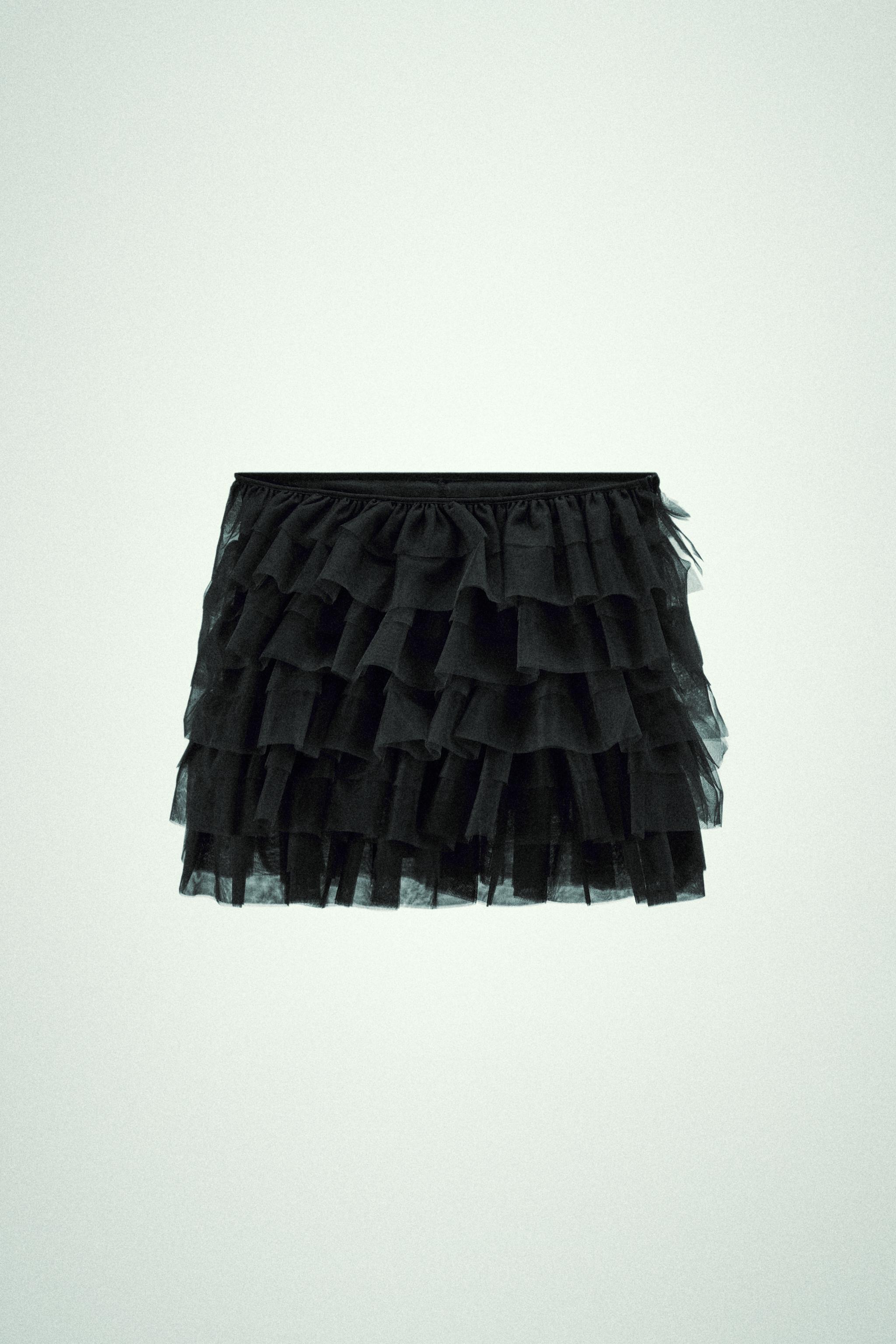 Mini skirt with a mid elastic waistband. Tulle ruffle details. Matching interior lining.<br/><br/>Halloween special collection. Product Image