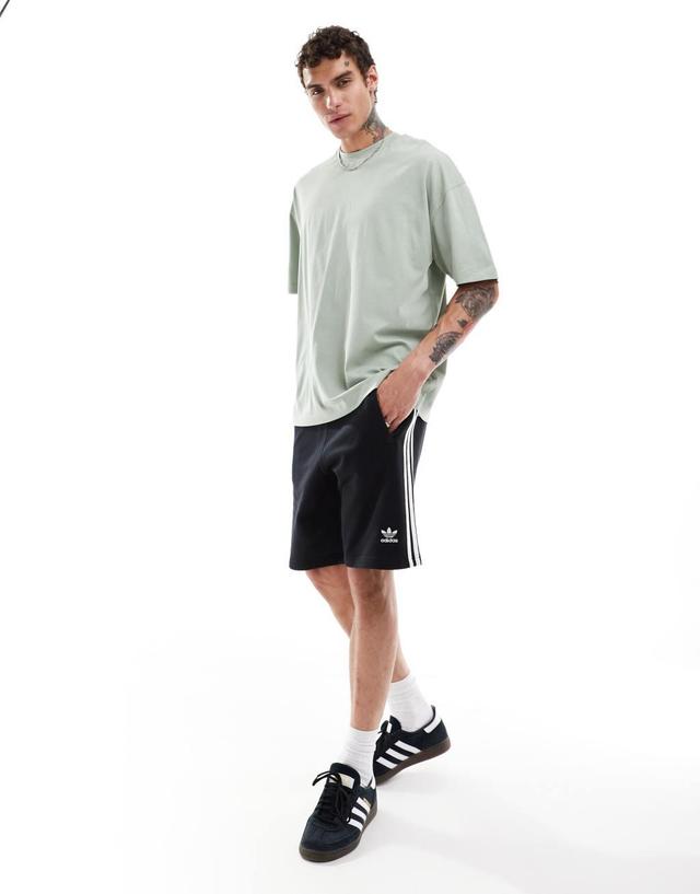 ASOS DESIGN oversized T-shirt in green with ramen back print Product Image