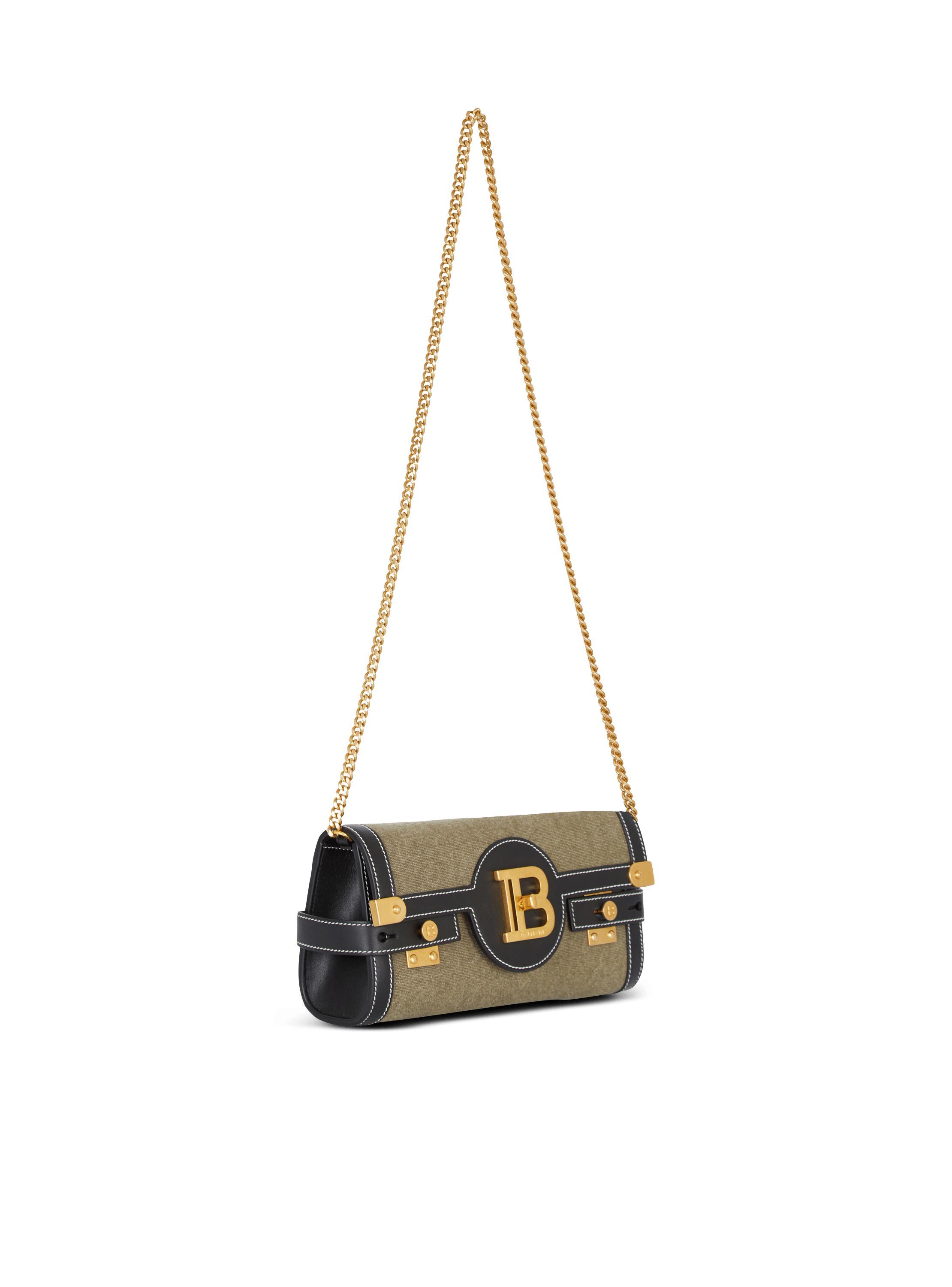 Canvas B-Buzz 23 clutch bag with leather panels Product Image