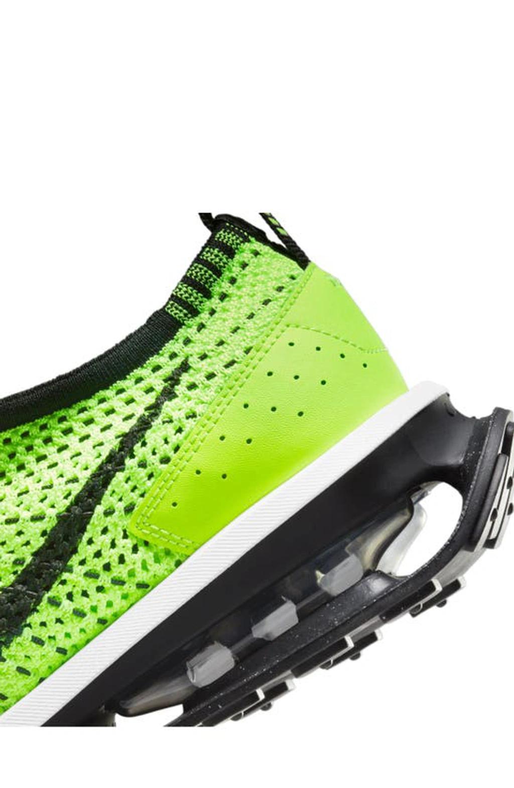 Air Max Flyknit Racer "volt" Sneakers In Yellow Product Image