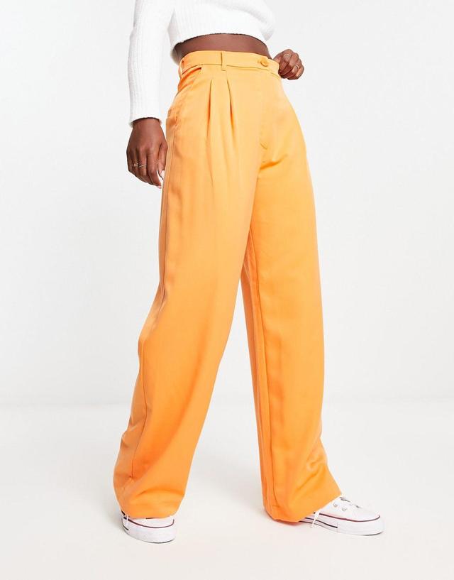 Monki high waist pleat front pants in orange Product Image