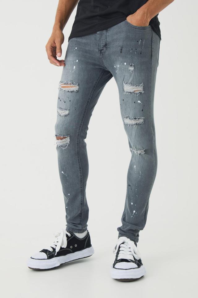 Skinny Stretch Rip & Repair Paint Splatter Jeans | boohooMAN USA Product Image