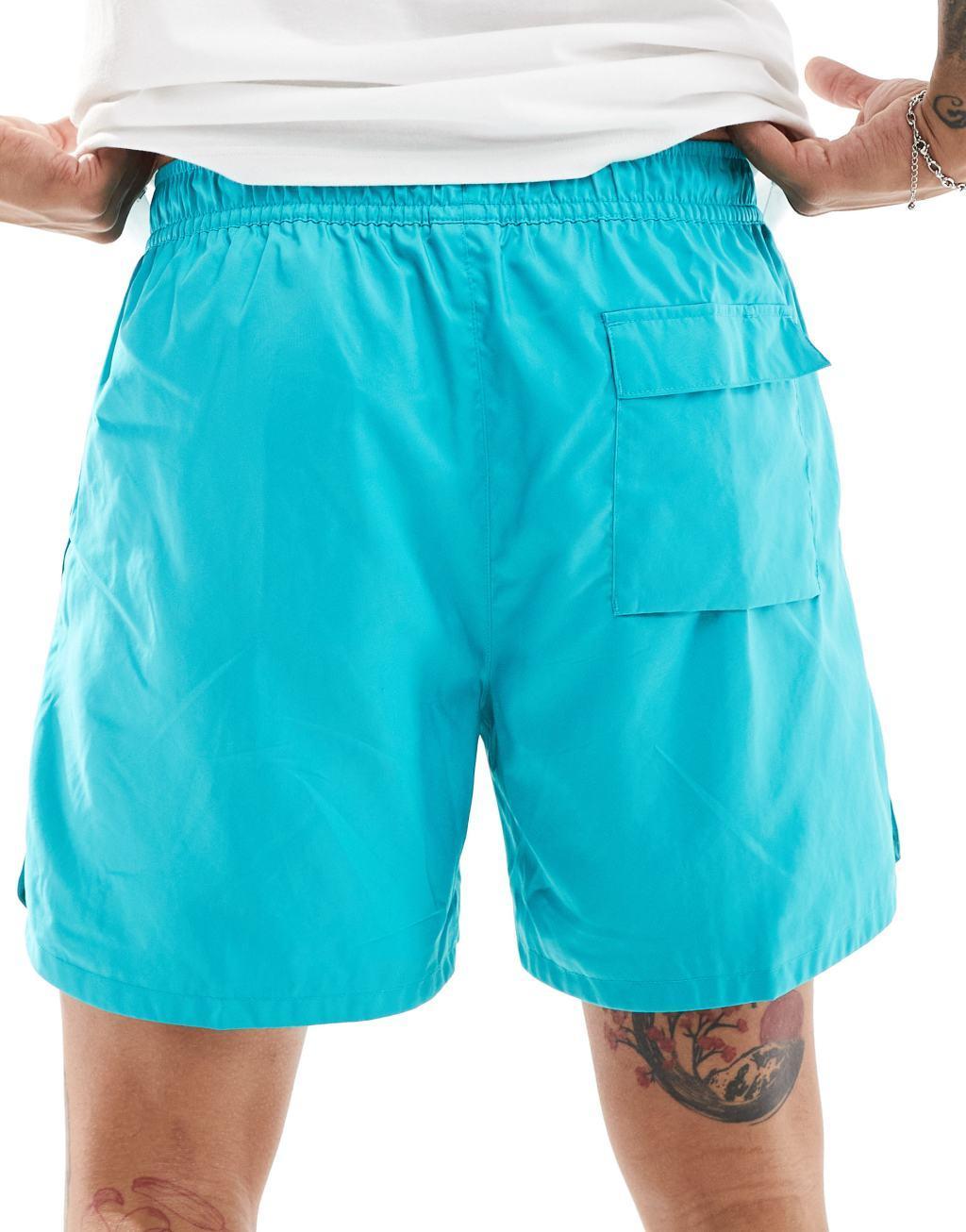 Nike Club woven logo printed shorts in aqua Product Image