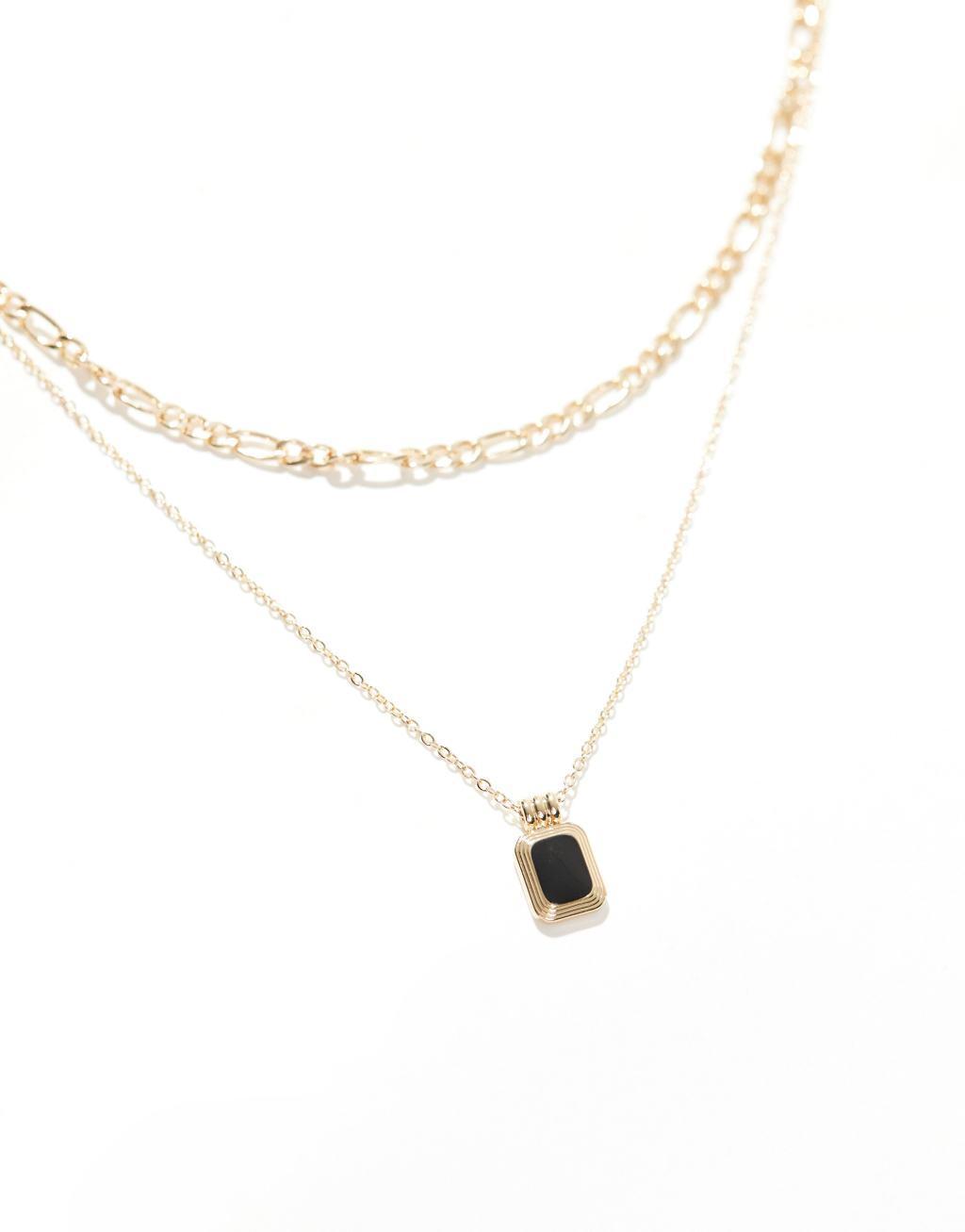 SVNX layered gold neckace with black stone pendant detail Product Image