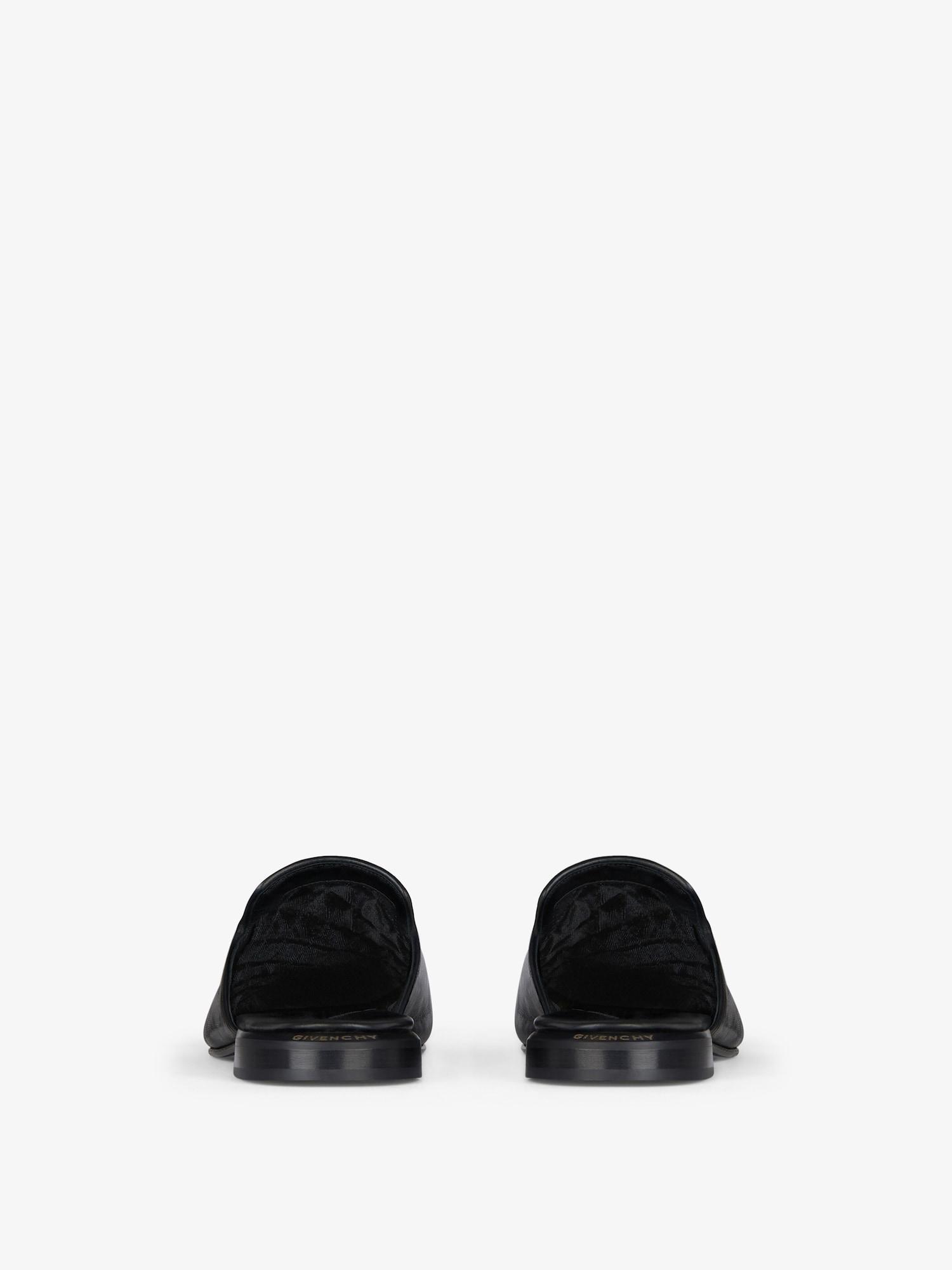 Flat mules in leather and suede Product Image