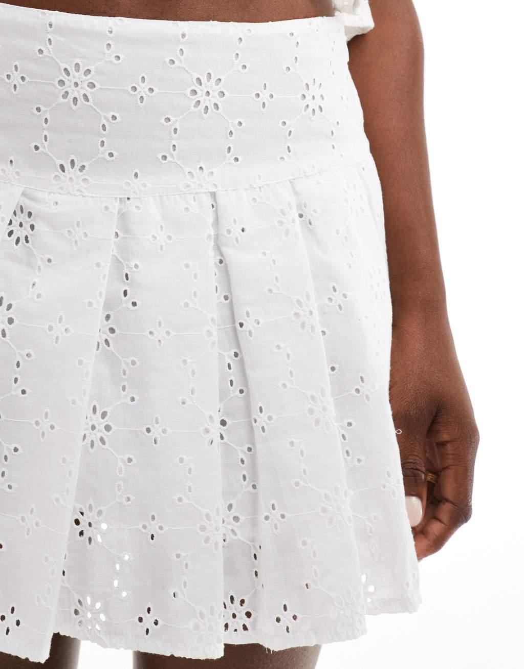 ASOS DESIGN pleated mini skirt in white eyelet Product Image