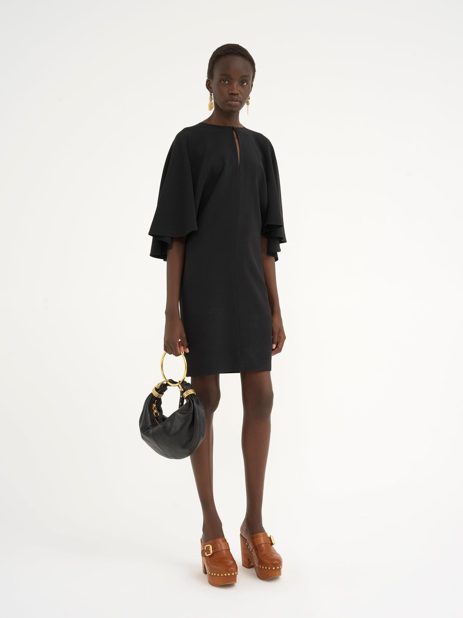 Short cape dress in viscose crêpe Product Image