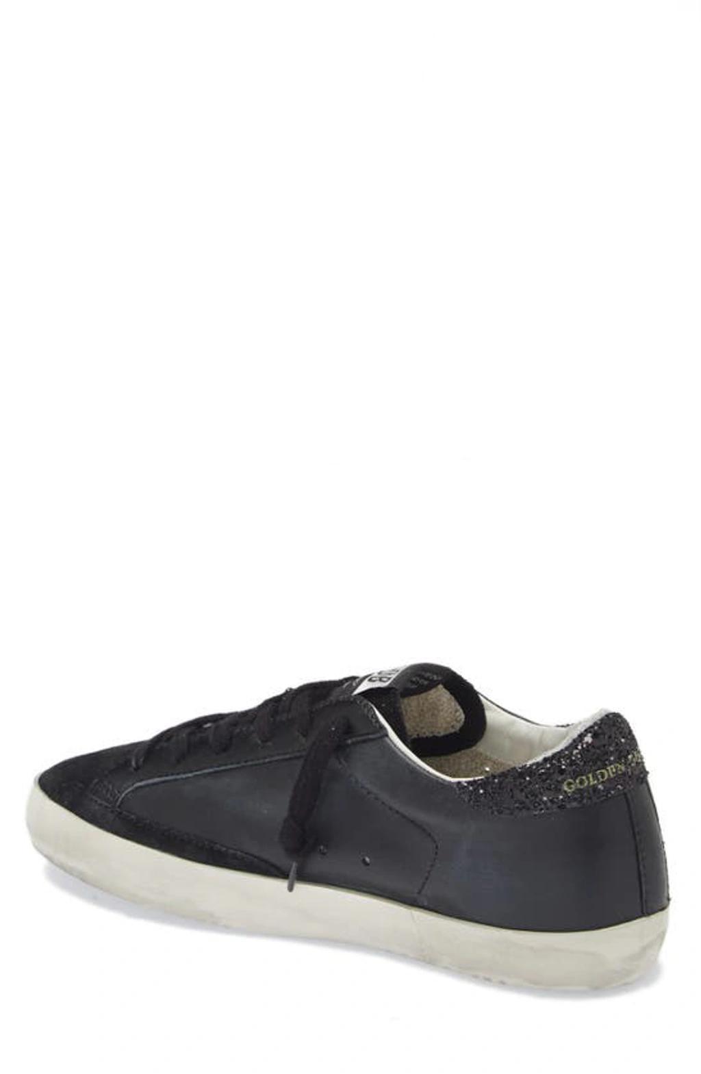 Superstar Leather Glitter Low-top Sneakers In Black Product Image