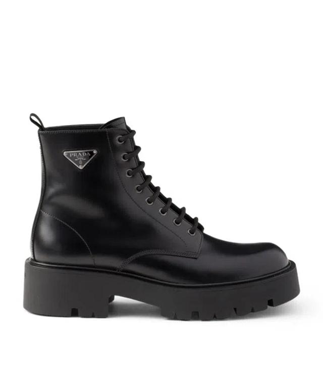 PRADA Logo Plaque Leather Combat Boots In Black Product Image