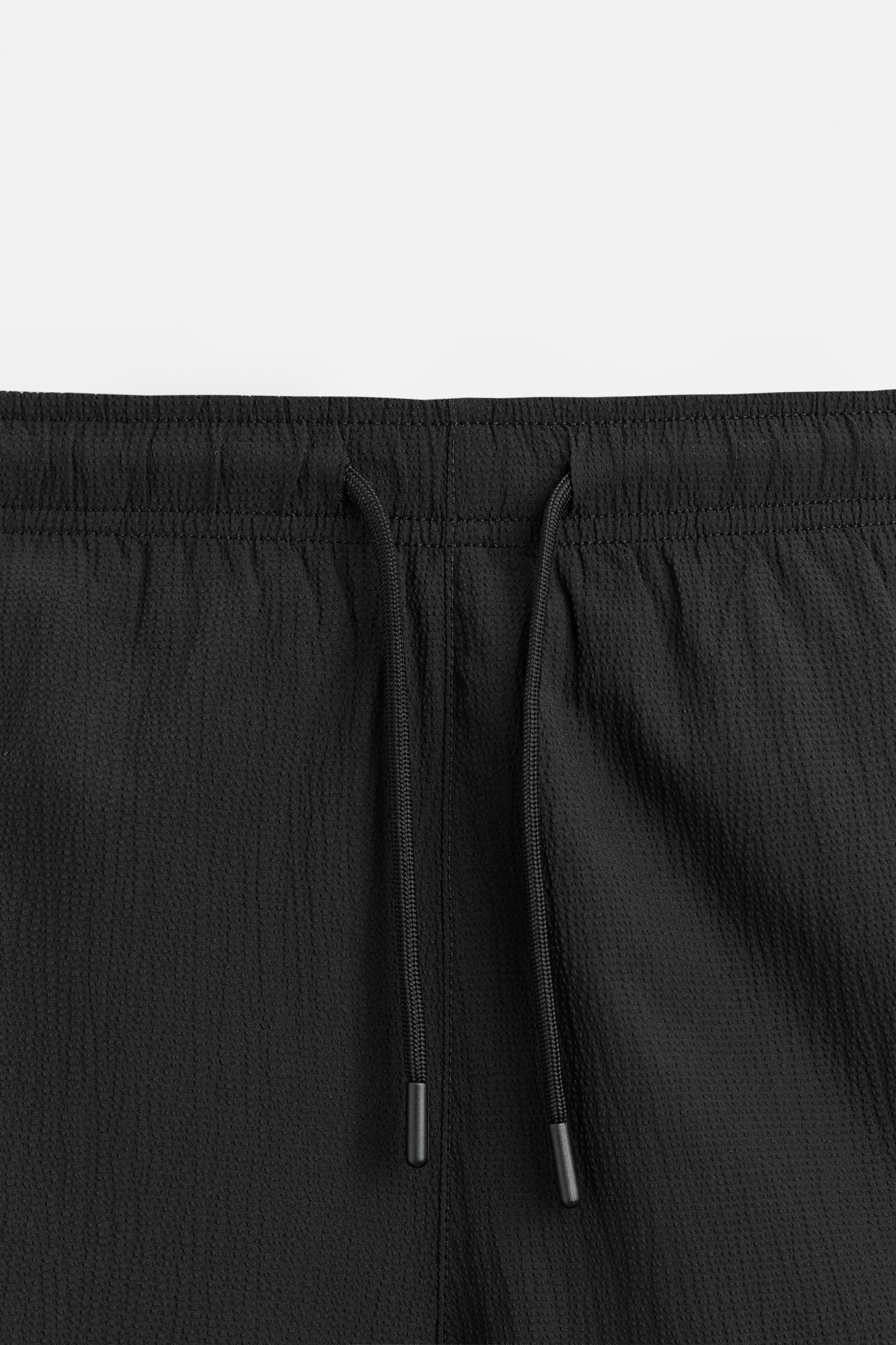 STRUCTURED REGULAR SWIM SHORTS Product Image