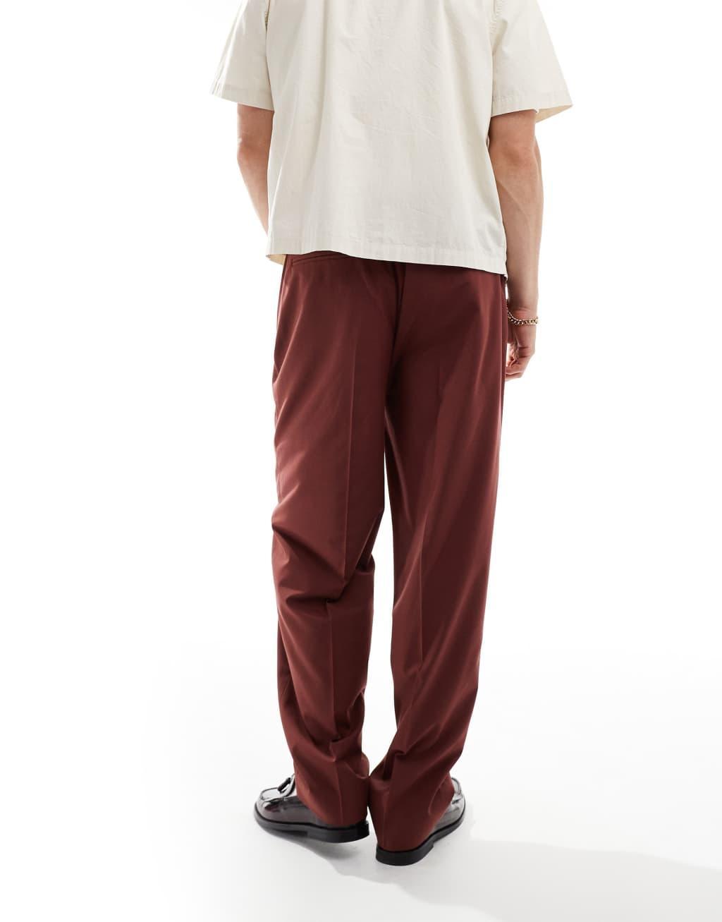 ASOS DESIGN pull on smart oversized tapered pants in burgundy Product Image