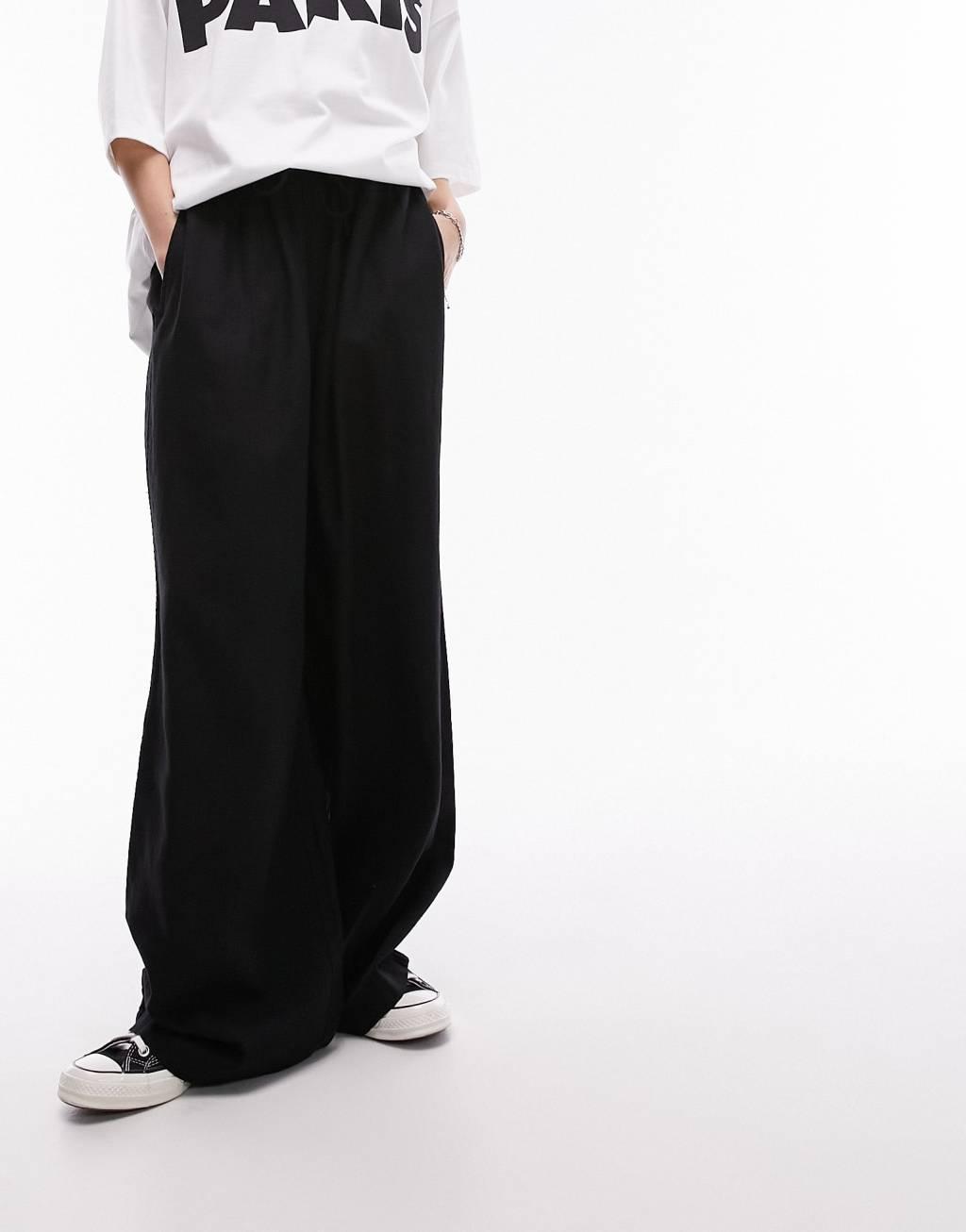 Topshop linen blend balloon pants in black Product Image