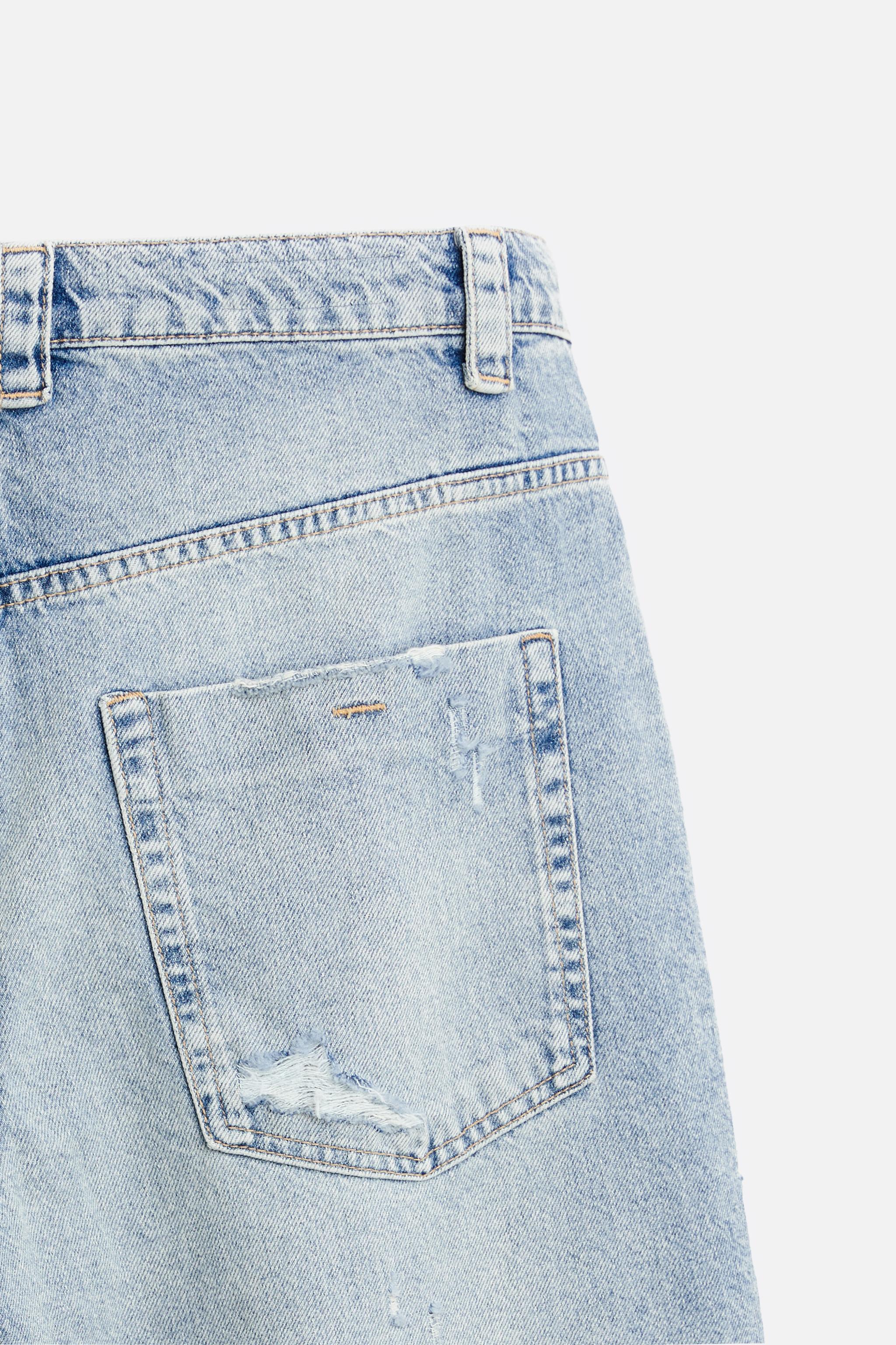 RIPPED EXTREME WASHED JEANS Product Image