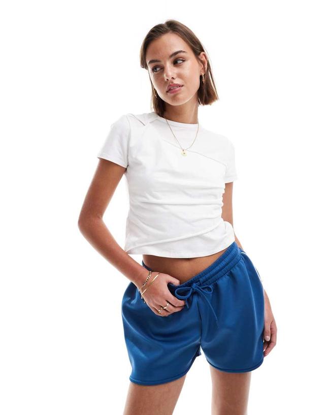 ASOS DESIGN twist front T-shirt in white Product Image