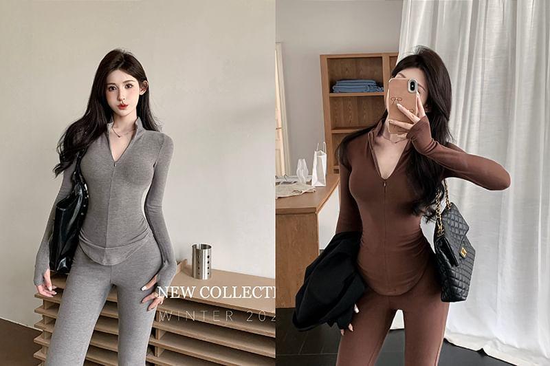 Set: Long-Sleeve Stand Collar Plain Half Zip Top + High Waist Plain Flared Pants Product Image