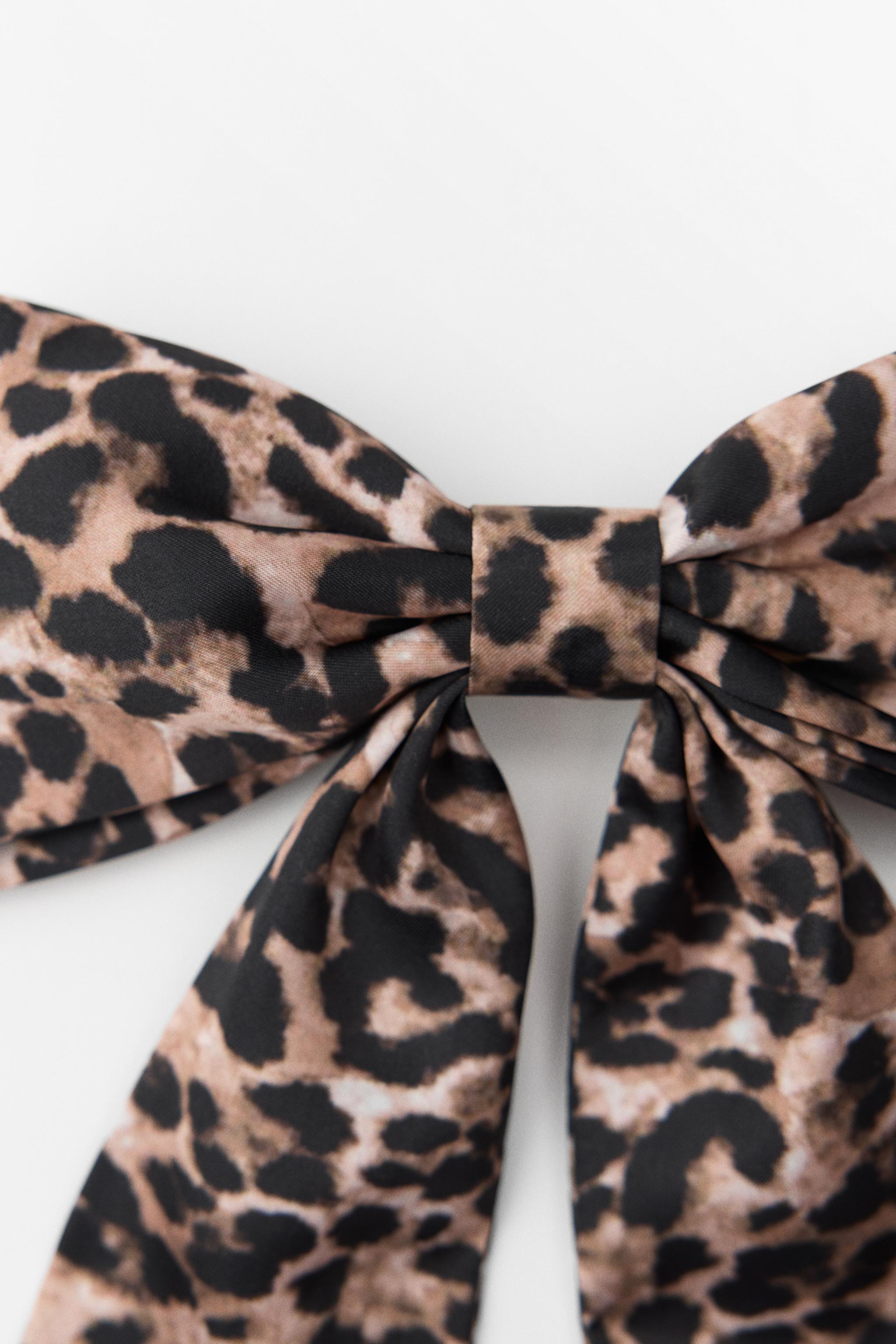 ANIMAL PRINT SATIN EFFECT BOW HAIR CLIP Product Image