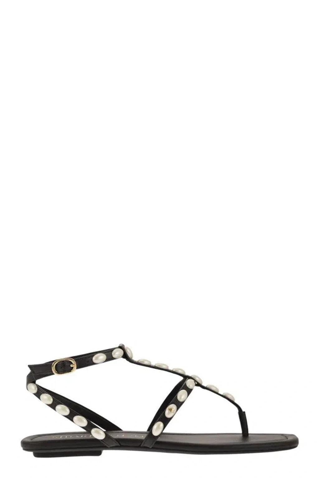 STUART WEITZMAN Pearlita Stud T-strap Sandals In Black Product Image