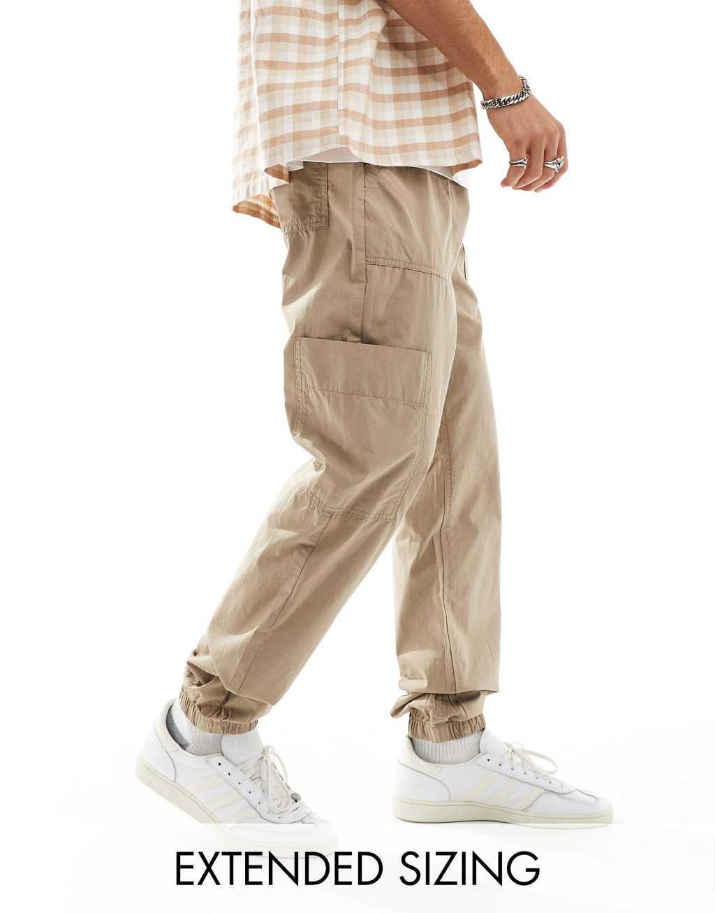 ASOS DESIGN tapered pull on cargo sweatpants in brown  Product Image