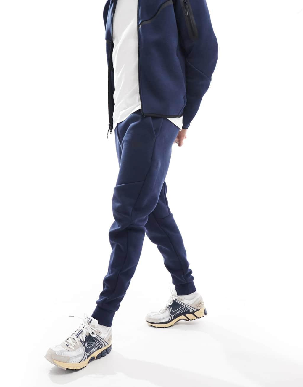 Nike Tech Fleece cuffed sweatpants in navy Product Image