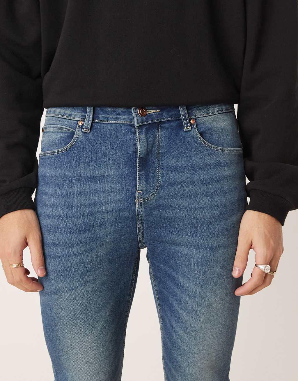 ASOS DESIGN power stretch jeans in dark wash blue Product Image