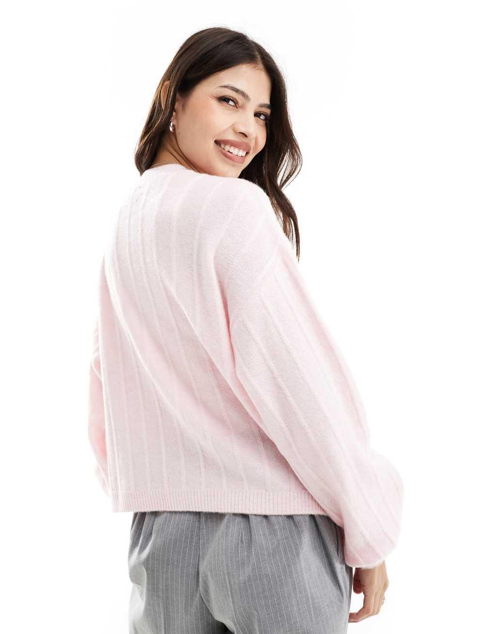 ASOS DESIGN fluffy oversized knitted cardigan in pink Product Image