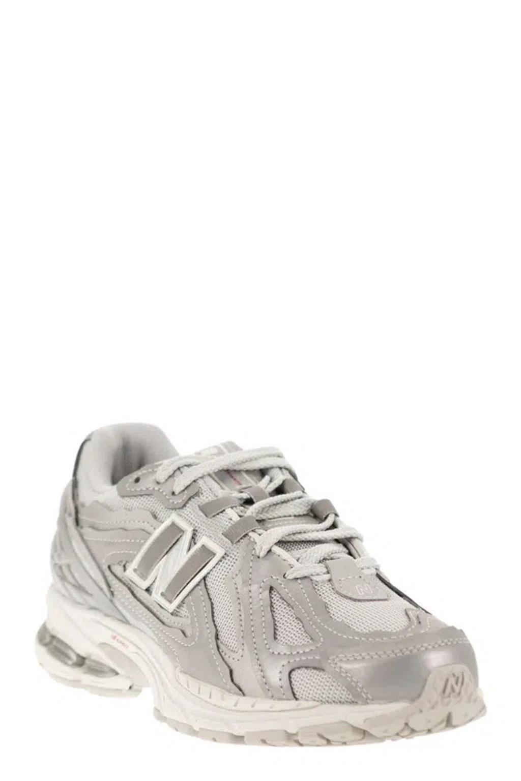 NEW BALANCE 1906r - Sneakers In Silver Product Image