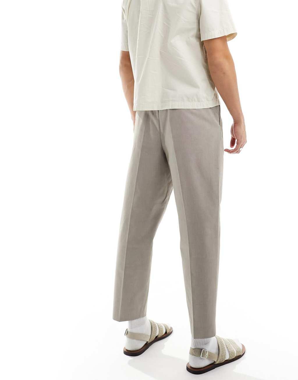 Selected Homme loose fit cropped pleat pants in beige Product Image