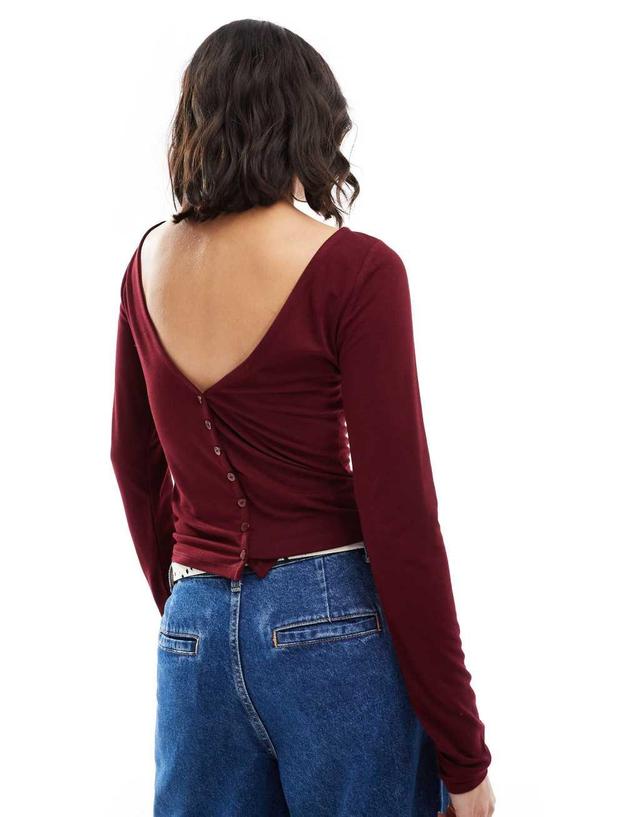 ASOS DESIGN long sleeve slash neck top with button detail in burgundy Product Image