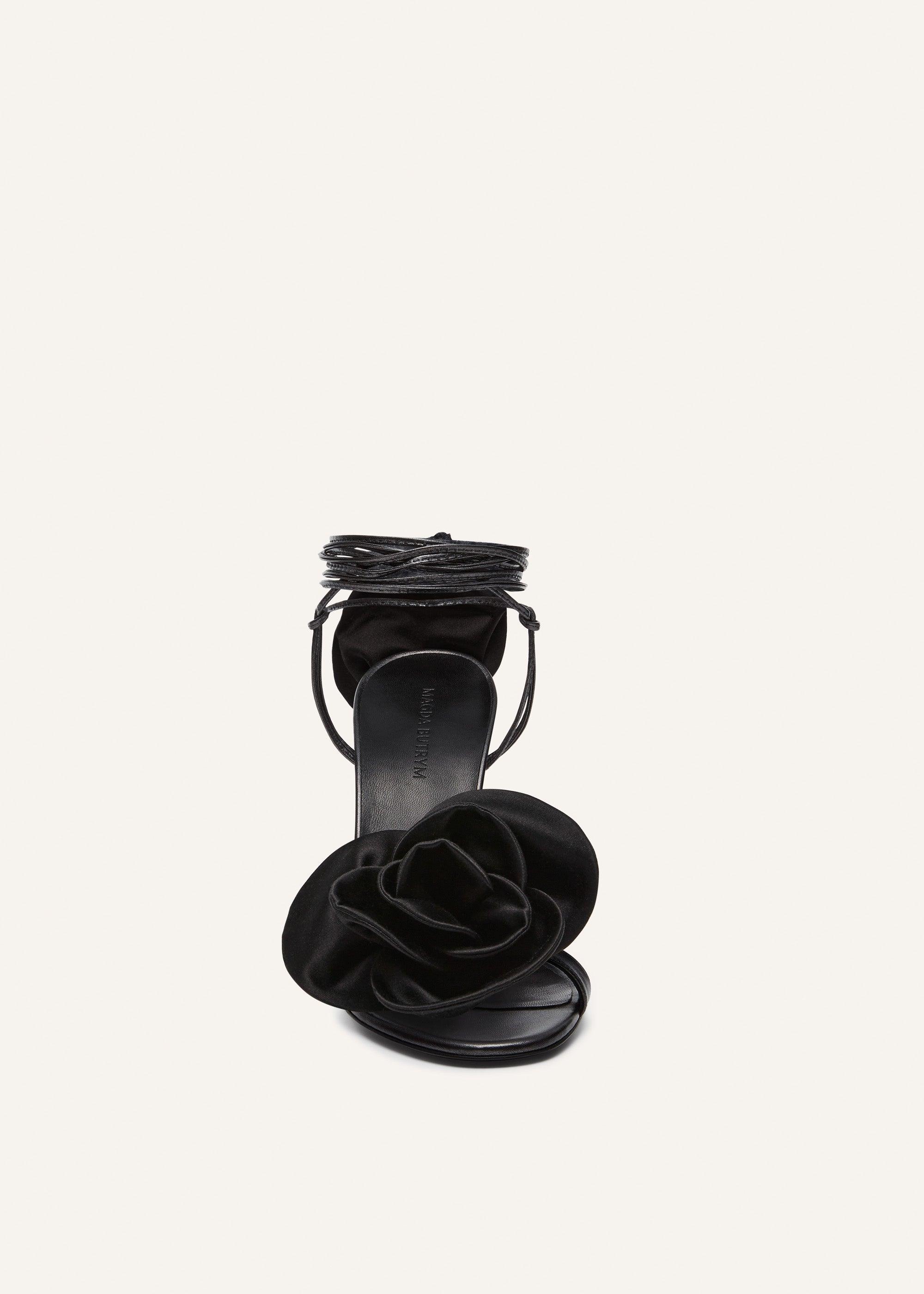 Wrap-around double-flower sandals in black leather Product Image