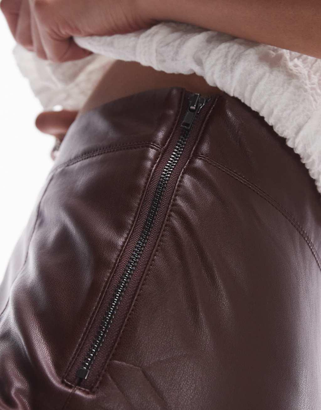 Topshop skinny faux leather pants in burgundy Product Image