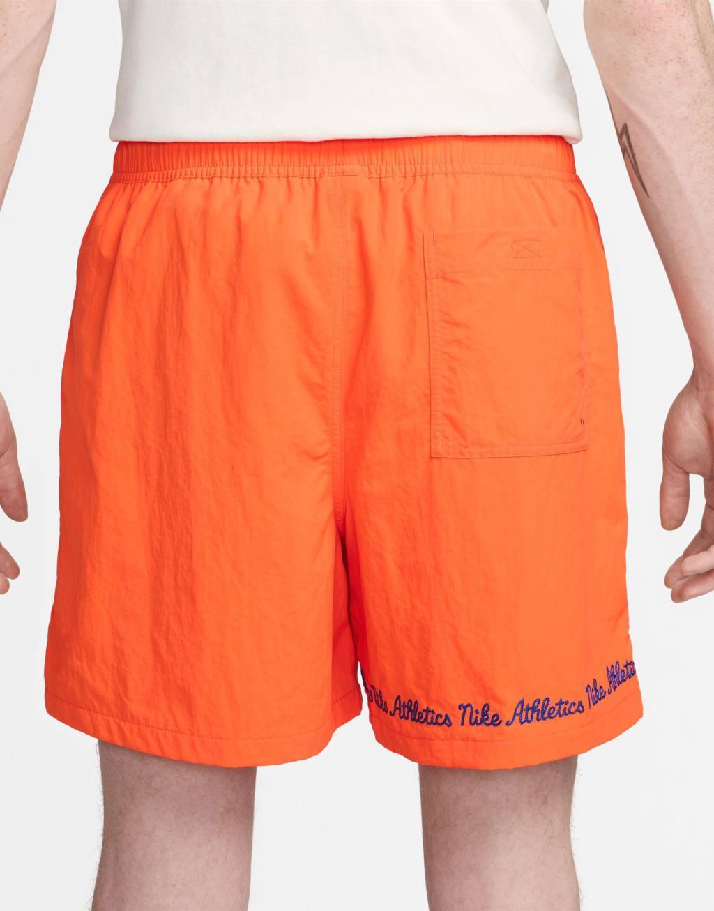 Nike Club varsity shorts in orange Product Image