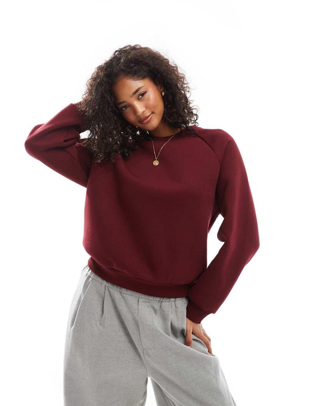 ASOS DESIGN raglan sweatshirt in burgundy Product Image