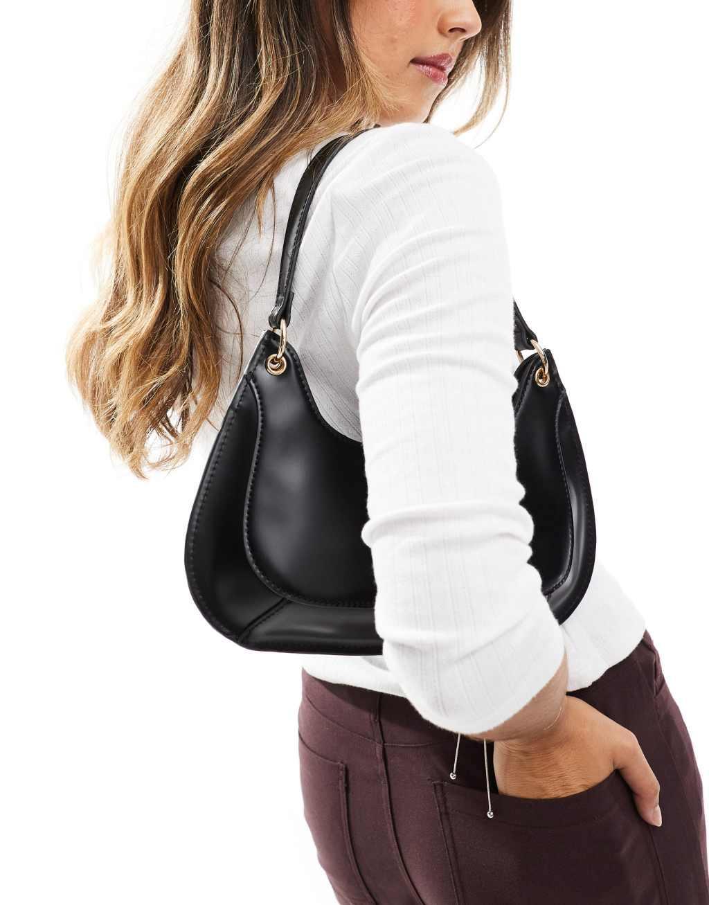 ASOS DESIGN shoulder bag with panel detail and ring hardware in black Product Image