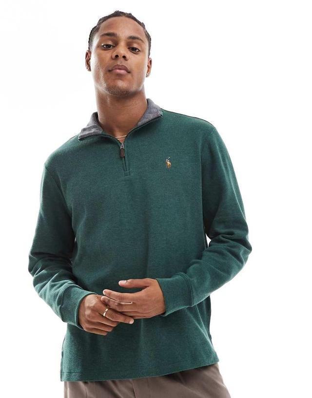 Polo Ralph Lauren icon logo jersey knit half zip sweatshirt in dark green heather Product Image