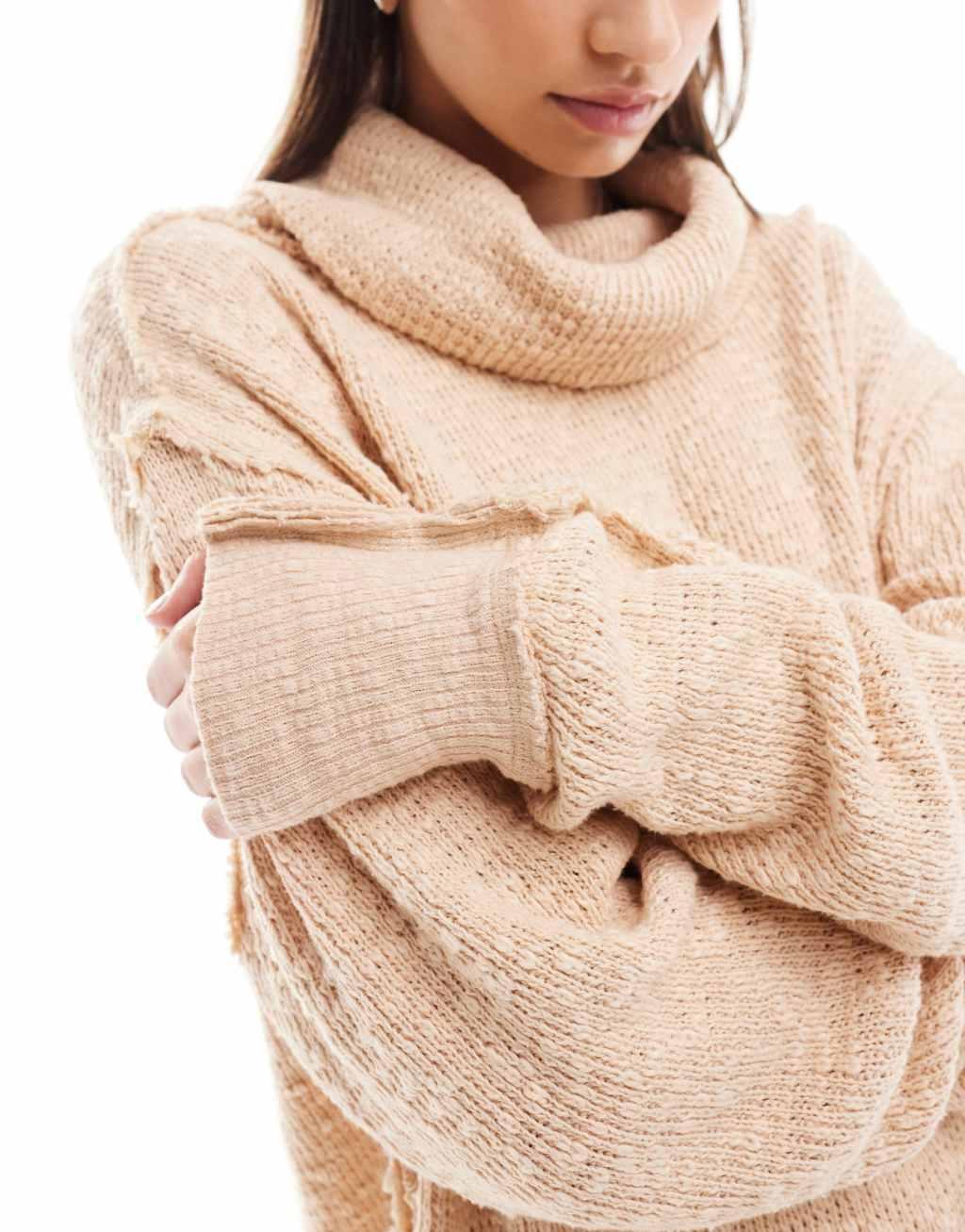 Free People roll neck slouchy sweater in camel Product Image