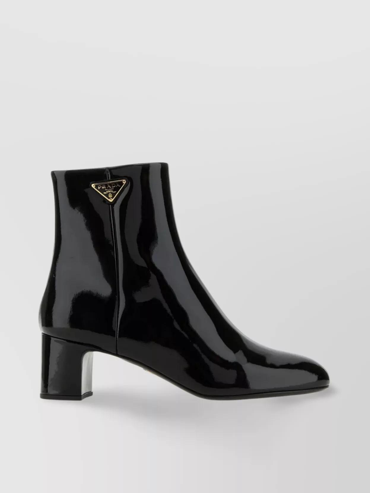 Leather Ankle Boots With Iconic Metal Triangle In Black product image