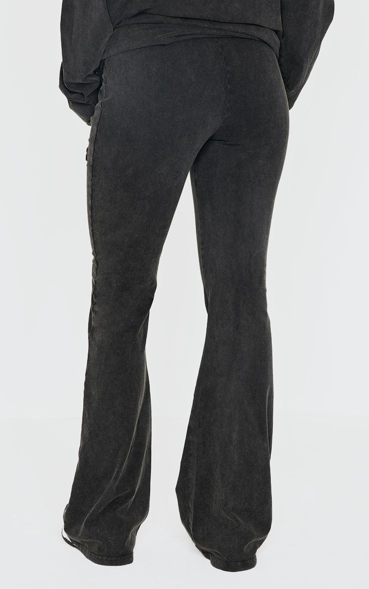 PRETTYLITTLETHING Black Embossed Logo Washed Skinny Flare Pants Product Image