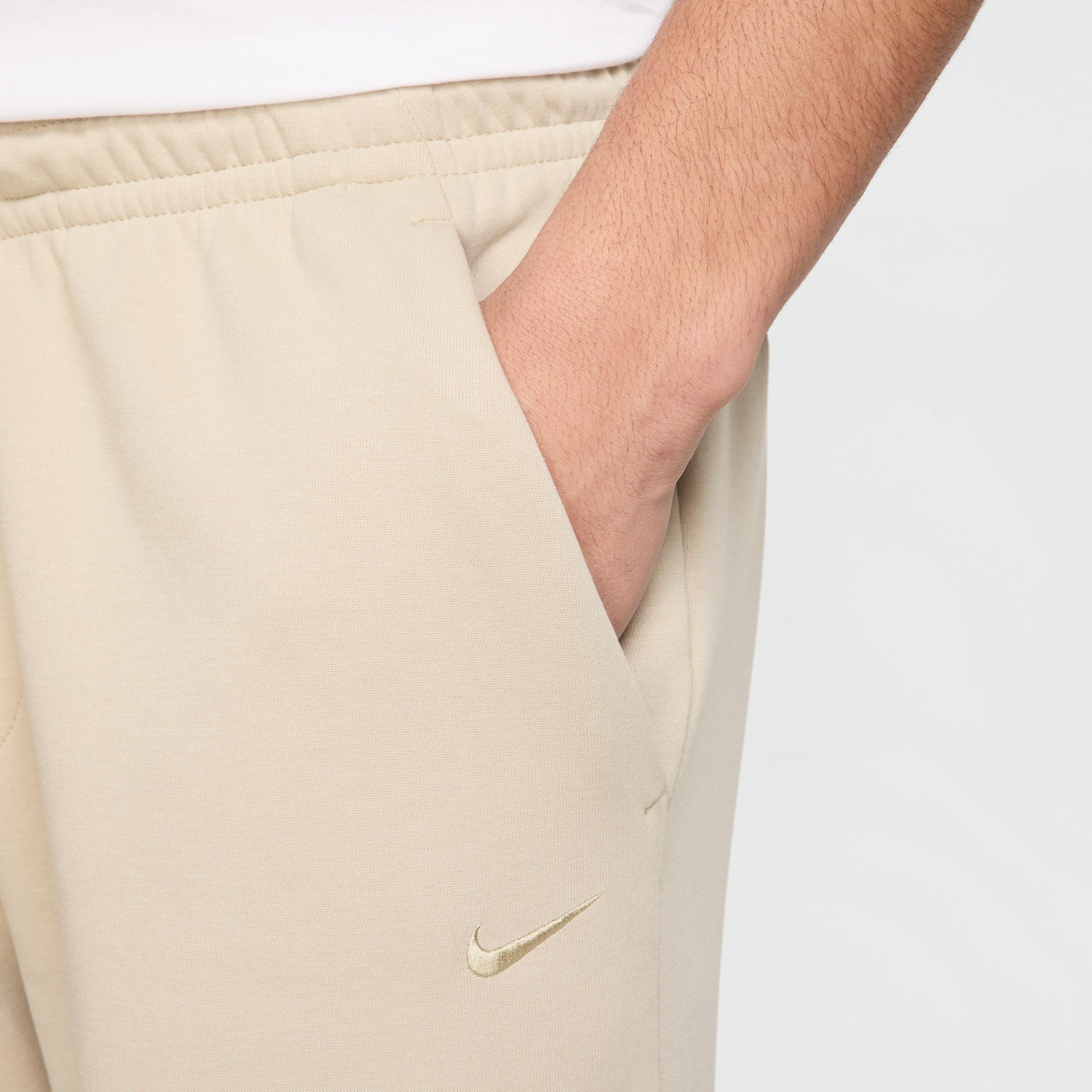 Nike Men's Primary Fleece Dri-FIT UV Tapered Performance Pants Product Image