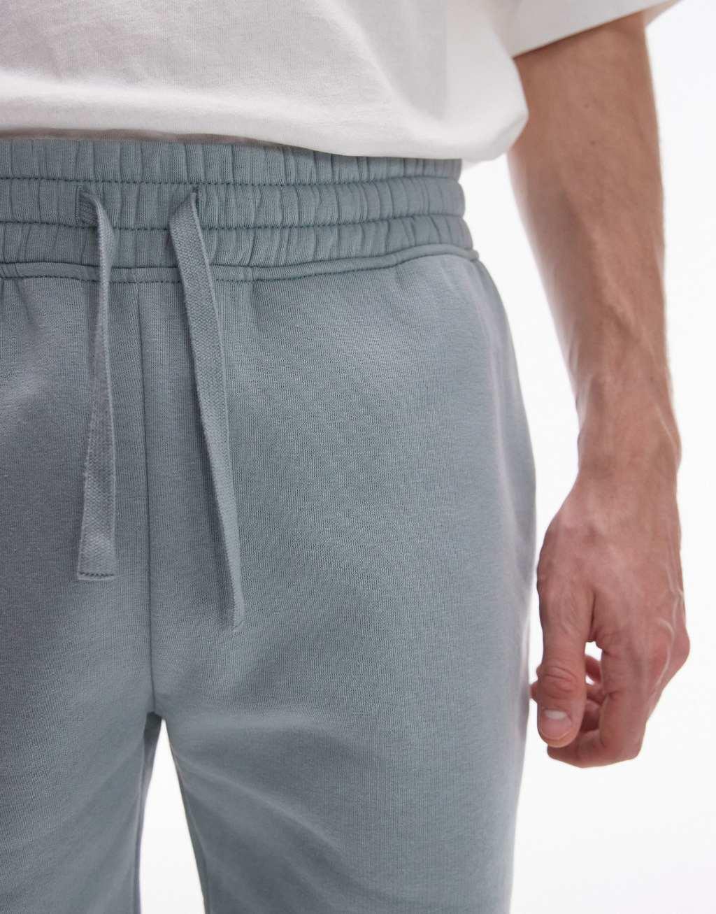 Topman classic fit jersey shorts with raw hem in sage Product Image