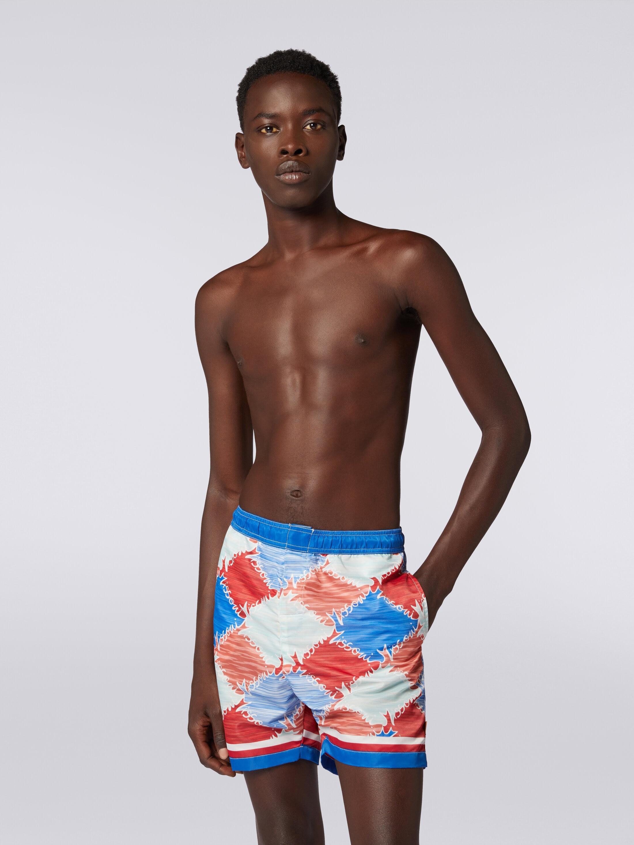 Swimming trunks in slub nylon with logo print Product Image