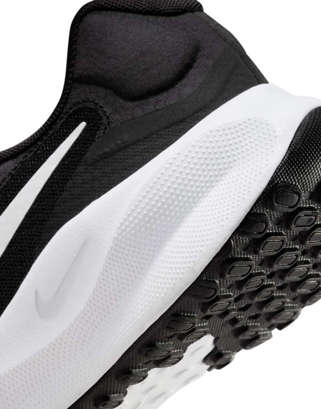 Nike Revolution 7 sneakers in black and white Product Image